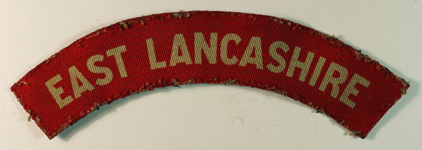 EAST LANCASHIRE WW2 Printed Shoulder Title Badge – CALICO PRINTERS — Lot No. 5834
