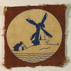 NETHERLANDS DISTRICT WW2 Printed Formation Sign Badge - CALICO PRINTERS --- Lot No. 6141