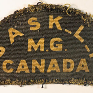 SASK.L.I. / M.G. / CANADA WW2 Canadian Printed Shoulder Title Badge - CALICO PRINTERS ---  Lot No. 6153