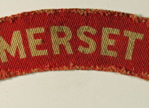 SOMERSET L.I. WW2 Printed Shoulder Title Badge - CALICO PRINTERS --- Lot No. 6156