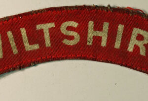 WILTSHIRE WW2 Printed Shoulder Title Badge - CALICO PRINTERS  ---  Lot No. 6210