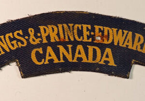 HASTINGS & PRINCE EDWARD REGT. / CANADA WW2 British Made Printed Shoulder Title Badge - CALICO PRINTERS ---  Lot No. 6246