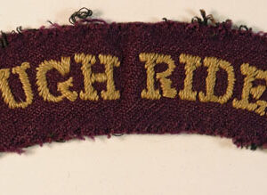 11th (CITY OF LONDON YEOMANRY) LAA Regiment (ROUGH RIDERS) WW2 Embroidered Shoulder Title Badge - Lot No: 6477