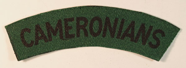 CAMERONIANS WW2 Printed Shoulder Title Badge – CALICO PRINTERS – SCARCE — Lot No. 6393