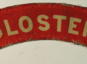 GLOSTER WW2 Printed Shoulder Title Badge - CALICO PRINTERS ---  Lot No. 6340