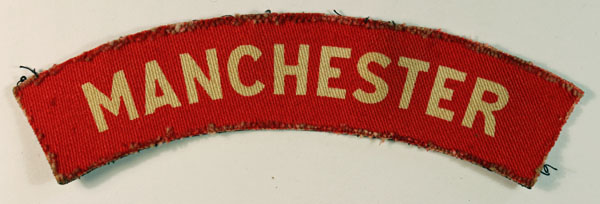 MANCHESTER Regiment WW2 Printed Shoulder Title Badge – CALICO PRINTERS — Lot No. 6546