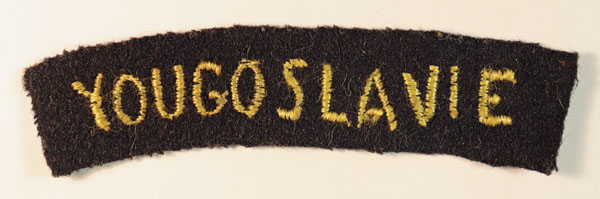 YOUGOSLAVIE – Free Forces/Partizans WW2 Shoulder Title Badge – SCARCE — Lot No. 6470A/SF25