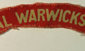 ROYAL WARWICKSHIRE WW2 Printed Shoulder Title Badge - CALICO PRINTERS  ---  Lot No. 6605