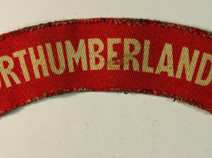 R.NORTHUMBERLAND FUS. WW2 Printed Shoulder Title Badge - CALICO PRINTERS  ---  Lot No. 6657