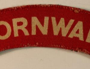CORNWALL - D.C.L.I. WW2 Early Printed Shoulder Title Badge - CALICO PRINTERS  ---  Lot No. 6786
