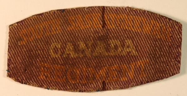 SOUTH SASKATCHEWAN / CANADA / REGIMENT WW2 Canadian Printed Shoulder Title Badge – CALICO PRINTERS — Lot No. 6855