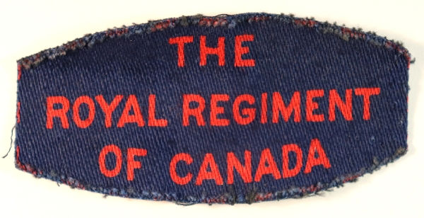 THE / ROYAL REGIMENT / OF CANADA WW2 Canadian Printed Shoulder Title Badge – CALICO PRINTERS — Lot No. 6857