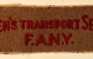 WOMEN'S TRANSPORT SERVICE / F.A.N.Y. WW2 Embroidered Shoulder Title Badge --- Lot No. 6860