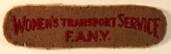 WOMEN’S TRANSPORT SERVICE / F.A.N.Y. WW2 Embroidered Shoulder Title Badge — Lot No. 6860