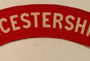 LEICESTERSHIRE WW2 Printed Shoulder Title Badge - CALICO PRINTERS  ---  Lot No. 6892