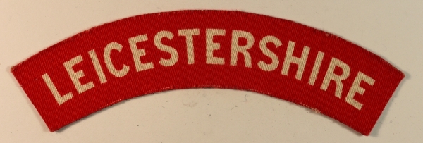 LEICESTERSHIRE WW2 Printed Shoulder Title Badge – CALICO PRINTERS — Lot No. 6892