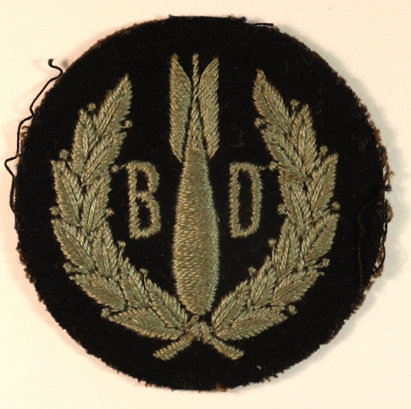 R.A.F. BOMB DISPOSAL – AMO A69 1941 WW2 Embroidered Arm Badge — Lot No. 6995